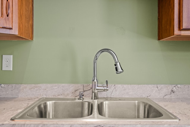 120 Chestnut Ln, Versailles, KY 40383 - kitchen view of a sink, light countertops, and brown cabinetry