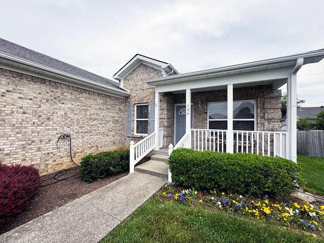 136 Janice Dr, Nicholasville, KY 40356 - property entrance featuring brick siding and covered porch
