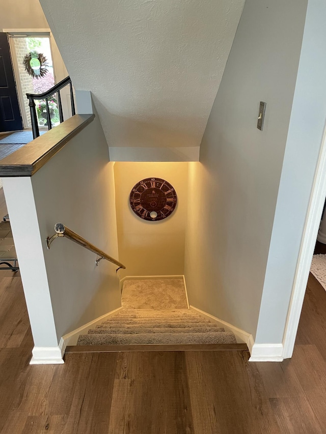 113 Paddock Ct, Frankfort, KY 40601 - stairway featuring wood finished floors, baseboards, lofted ceiling, and a textured ceiling