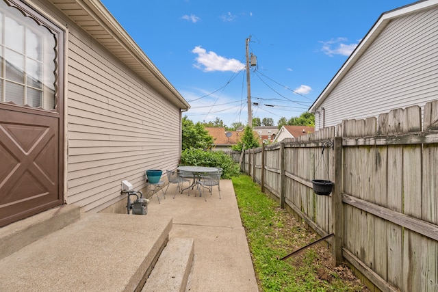 view of patio with a fenced backyard