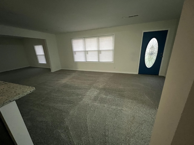 2789 Steadmantown Ln, Frankfort, KY 40601 - unfurnished living room with dark colored carpet and baseboards