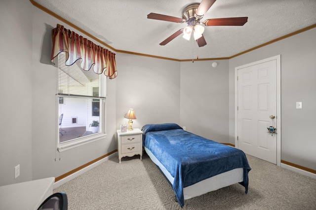 209 Brook Dr, Jeffersonville, KY 40337 - carpeted bedroom with ornamental molding, baseboards, a textured ceiling, and a ceiling fan