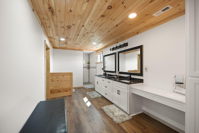 61 Cumberland Cv, Nancy, KY 42544 - bathroom featuring tiled shower, recessed lighting, double vanity, wood finished floors, and wood ceiling