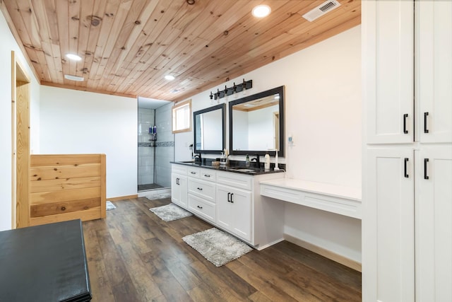 61 Cumberland Cv, Nancy, KY 42544 - bathroom with double vanity, a stall shower, recessed lighting, wood finished floors, and baseboards