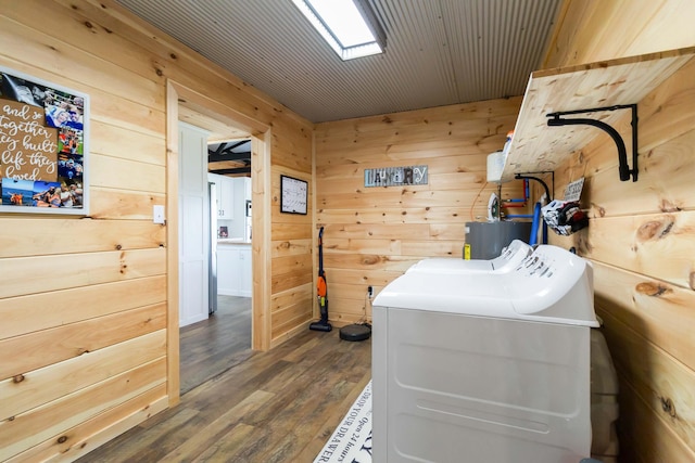 61 Cumberland Cv, Nancy, KY 42544 - laundry area with wood walls, dark wood-type flooring, and washing machine and dryer