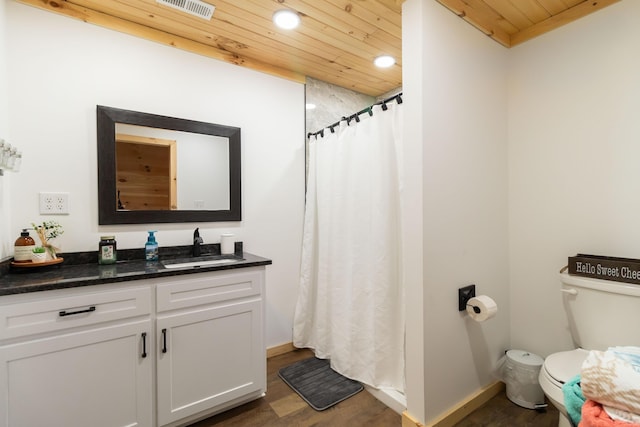 61 Cumberland Cv, Nancy, KY 42544 - bathroom with wooden ceiling, vanity, toilet, wood finished floors, and baseboards