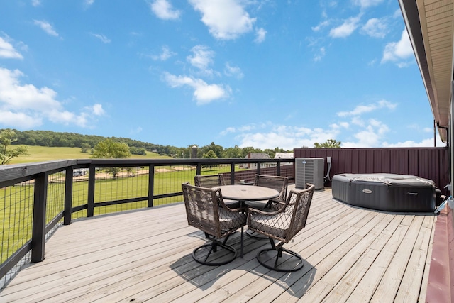 61 Cumberland Cv, Nancy, KY 42544 - wooden terrace featuring outdoor dining space, a yard, central AC, and a hot tub