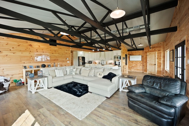 61 Cumberland Cv, Nancy, KY 42544 - living room featuring wooden walls, high vaulted ceiling, wood finished floors, and beam ceiling