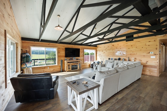 61 Cumberland Cv, Nancy, KY 42544 - living area with wood walls, beam ceiling, wood finished floors, and high vaulted ceiling