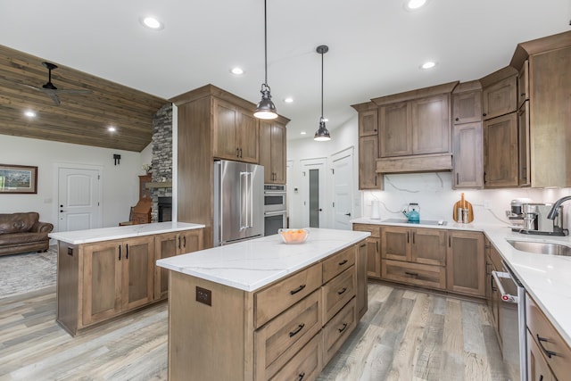 269 Ashley Camp Rd, Harrodsburg, KY 40330 - kitchen featuring a sink, stainless steel appliances, a kitchen island, light wood-type flooring, and recessed lighting