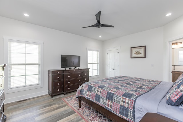 269 Ashley Camp Rd, Harrodsburg, KY 40330 - bedroom with light wood-type flooring, recessed lighting, baseboards, ceiling fan, and ensuite bath