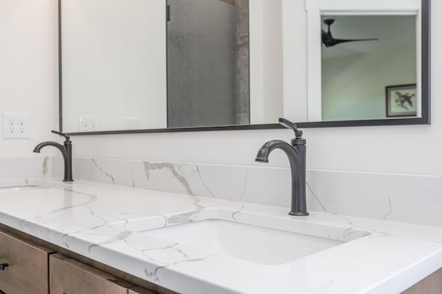 269 Ashley Camp Rd, Harrodsburg, KY 40330 - bathroom with a ceiling fan and double vanity