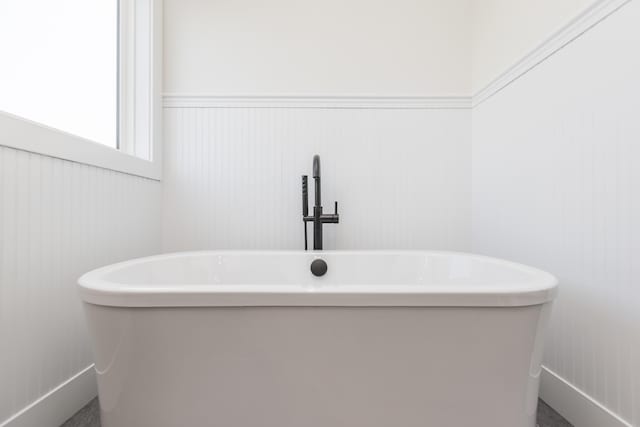 269 Ashley Camp Rd, Harrodsburg, KY 40330 - full bathroom featuring wainscoting, a freestanding tub, and baseboards