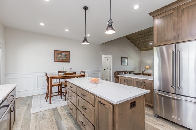 269 Ashley Camp Rd, Harrodsburg, KY 40330 - kitchen with high quality fridge, wainscoting, light wood-style floors, a kitchen island, and pendant lighting