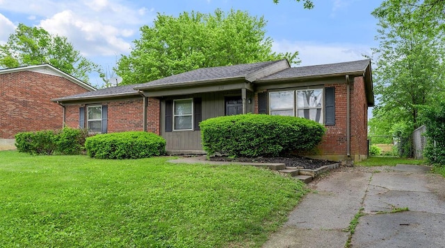 view of front of property featuring brick siding
