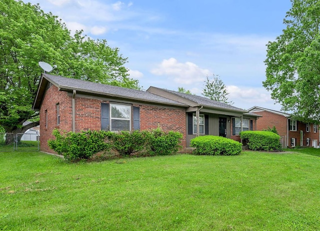 ranch-style house with brick siding