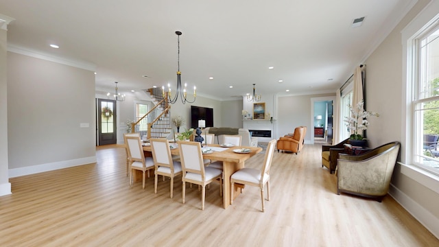 840 A T Dean Rd, Harrodsburg, KY 40330 - dining room featuring light wood finished floors, crown molding, baseboards, recessed lighting, and a chandelier