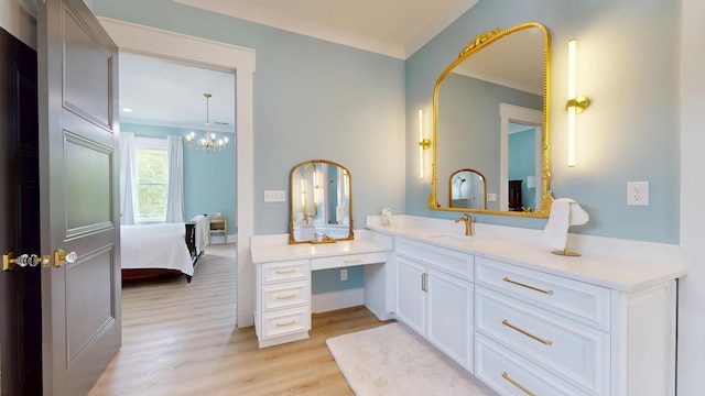 840 A T Dean Rd, Harrodsburg, KY 40330 - bathroom featuring crown molding, connected bathroom, wood finished floors, vanity, and a chandelier