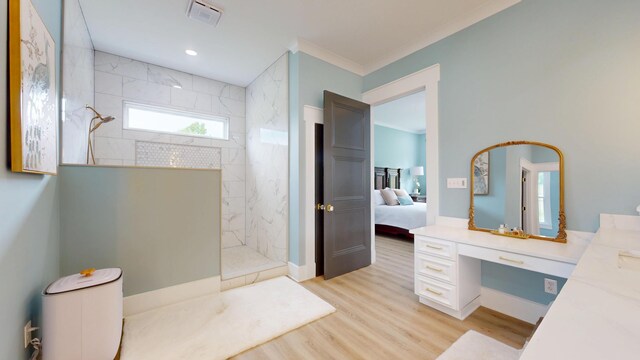 840 A T Dean Rd, Harrodsburg, KY 40330 - ensuite bathroom with a marble finish shower, vanity, wood finished floors, and ornamental molding