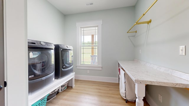 840 A T Dean Rd, Harrodsburg, KY 40330 - washroom featuring independent washer and dryer, light wood finished floors, and baseboards