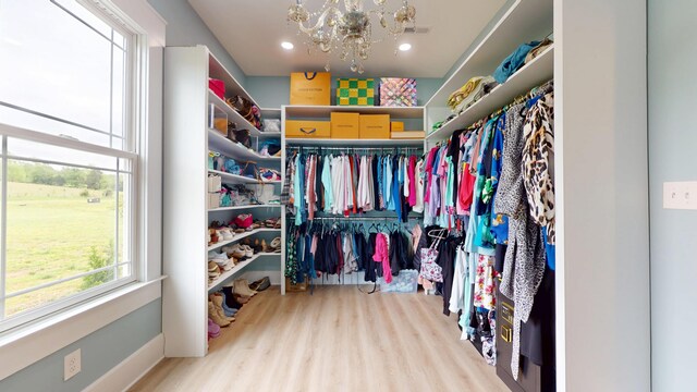 840 A T Dean Rd, Harrodsburg, KY 40330 - spacious closet with a chandelier and wood finished floors