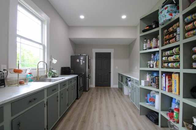 840 A T Dean Rd, Harrodsburg, KY 40330 - kitchen featuring a sink, light wood-type flooring, open shelves, stainless steel electric stove, and light countertops