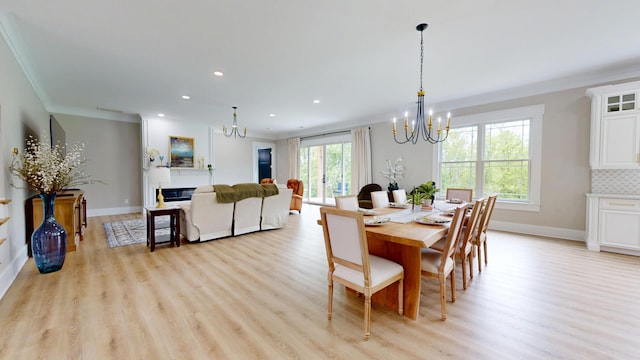 840 A T Dean Rd, Harrodsburg, KY 40330 - dining room with a chandelier, ornamental molding, light wood finished floors, baseboards, and recessed lighting