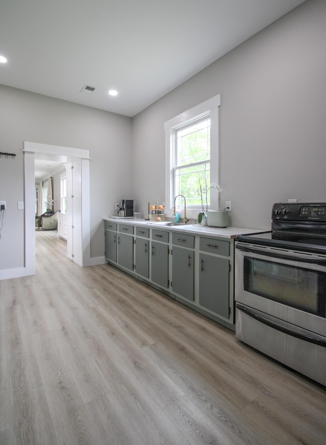 840 A T Dean Rd, Harrodsburg, KY 40330 - kitchen with electric range, plenty of natural light, light wood-style flooring, recessed lighting, and light countertops