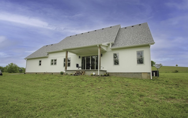 840 A T Dean Rd, Harrodsburg, KY 40330 - rear view of house featuring roof with shingles and a lawn