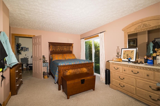 388 Mc Roberts Rd, Wallingford, KY 41093 - bedroom with a textured ceiling, light carpet, and access to outside