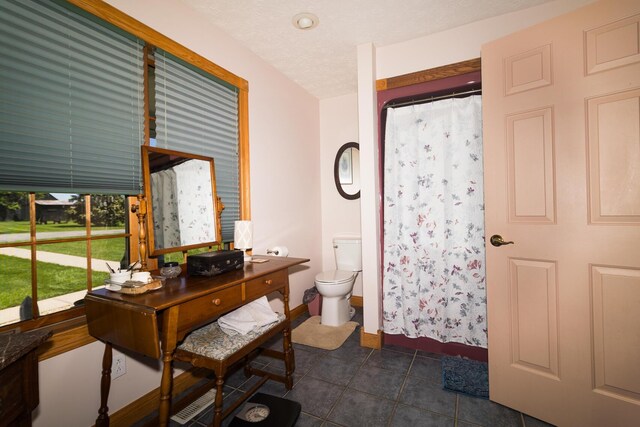 388 Mc Roberts Rd, Wallingford, KY 41093 - office featuring dark tile patterned flooring and baseboards