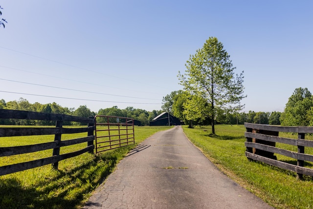 388 Mc Roberts Rd, Wallingford, KY 41093 - view of asphalt driveway featuring a gate