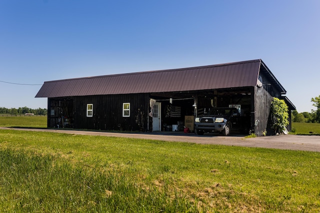 388 Mc Roberts Rd, Wallingford, KY 41093 - view of pole building with a lawn and asphalt driveway