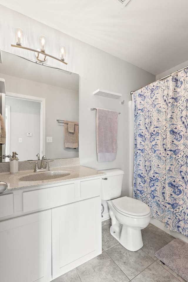 full bath with toilet, vanity, tile patterned flooring, and a shower with curtain