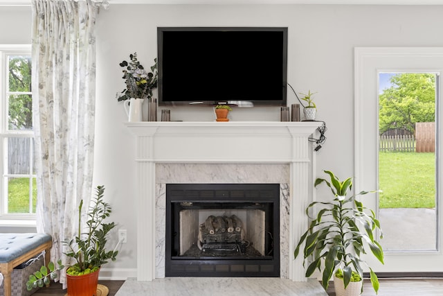 detailed view of a high end fireplace and baseboards