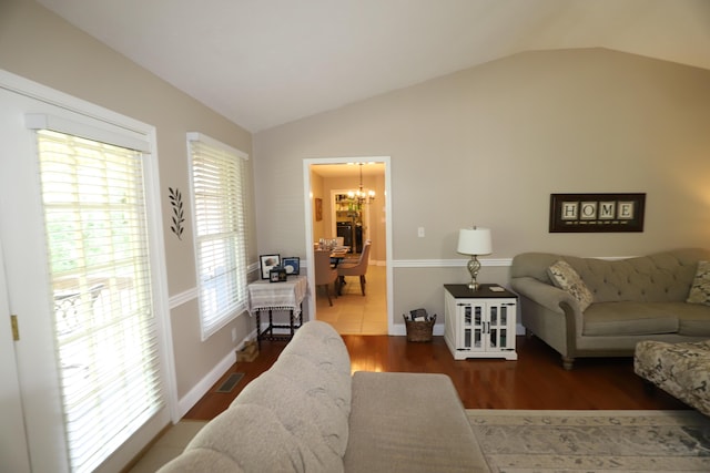 71 View Point Dr, Somerset, KY 42503 - living room featuring a chandelier, lofted ceiling, and wood finished floors