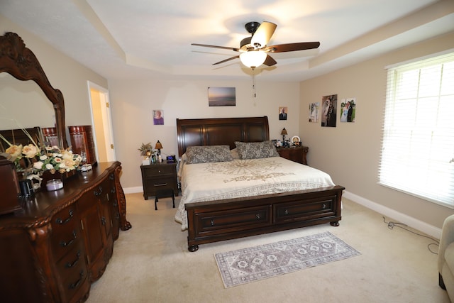 71 View Point Dr, Somerset, KY 42503 - bedroom featuring a tray ceiling, light carpet, baseboards, and a ceiling fan