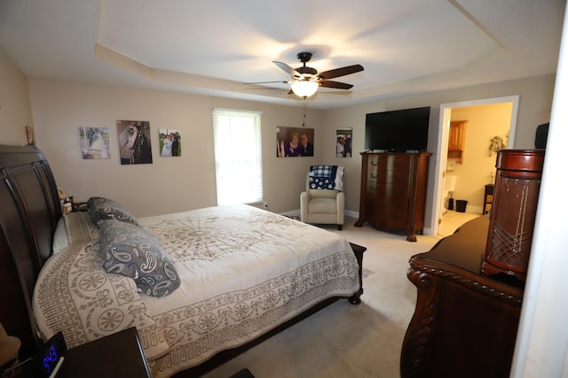 71 View Point Dr, Somerset, KY 42503 - bedroom featuring a raised ceiling, light carpet, a ceiling fan, and ensuite bath