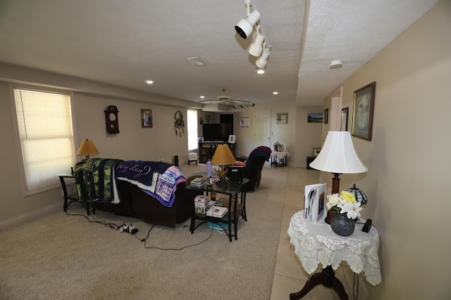 71 View Point Dr, Somerset, KY 42503 - living area with rail lighting, light colored carpet, ceiling fan, recessed lighting, and baseboards