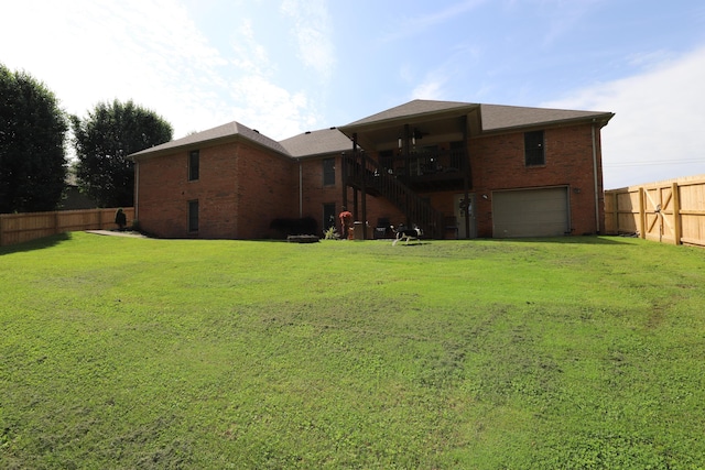 71 View Point Dr, Somerset, KY 42503 - back of property with brick siding, stairs, a garage, and driveway