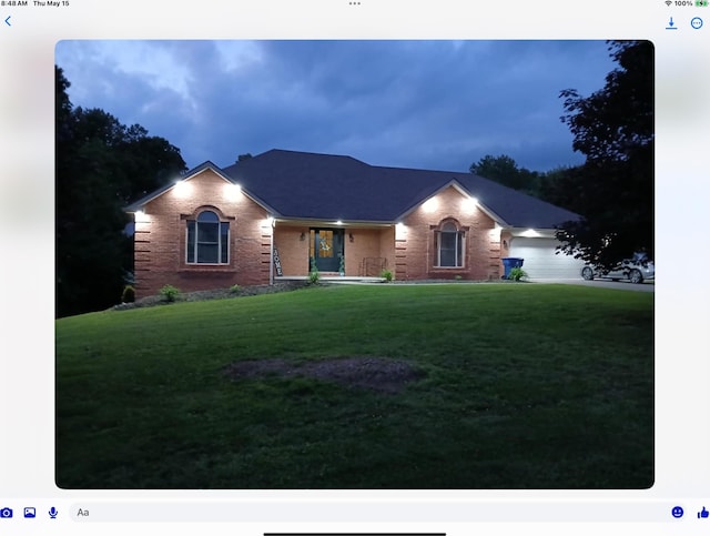 71 View Point Dr, Somerset, KY 42503 - ranch-style house featuring brick siding, a front yard, covered porch, and a garage