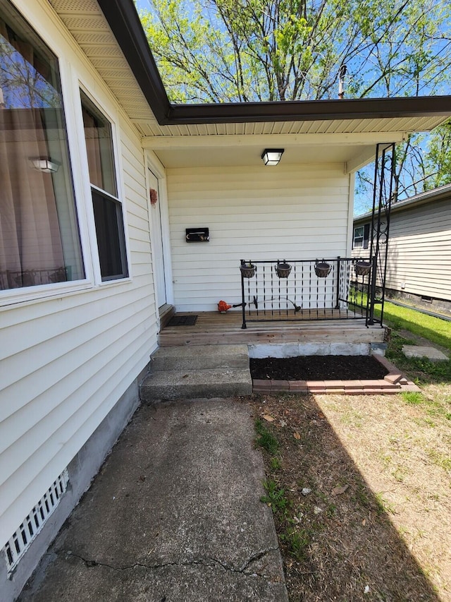 wooden terrace featuring a porch