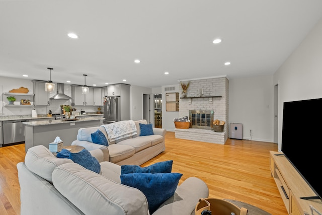 3540 Cornwall Dr, Lexington, KY 40503 - living area featuring recessed lighting, light wood-type flooring, and a fireplace