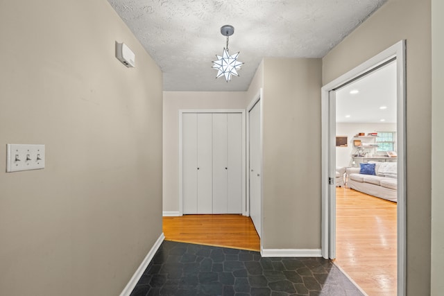 3540 Cornwall Dr, Lexington, KY 40503 - corridor with a textured ceiling and baseboards