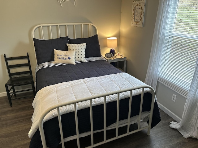 842 Lower Cane Creek Rd, Stanton, KY 40380 - bedroom with multiple windows, wood finished floors, and baseboards