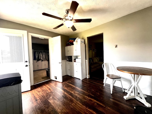 201 Longview St, Harrodsburg, KY 40330 - dining area featuring dark wood-type flooring, a ceiling fan, and baseboards