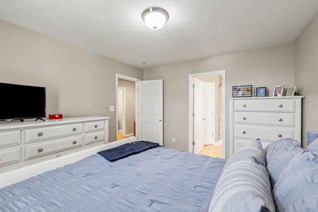 bedroom with ensuite bath