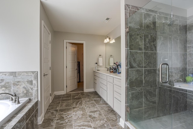 465 Manitoba Ln, Lexington, KY 40515 - bathroom with a garden tub, a stall shower, vanity, and baseboards