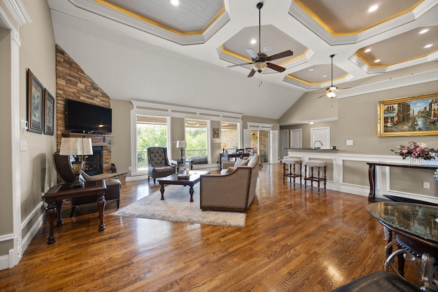43 Enclave Dr, Somerset, KY 42503 - living area featuring a stone fireplace, ceiling fan, lofted ceiling, wood finished floors, and crown molding