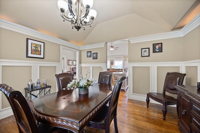 43 Enclave Dr, Somerset, KY 42503 - dining space with a decorative wall, a chandelier, a wainscoted wall, vaulted ceiling, and wood finished floors